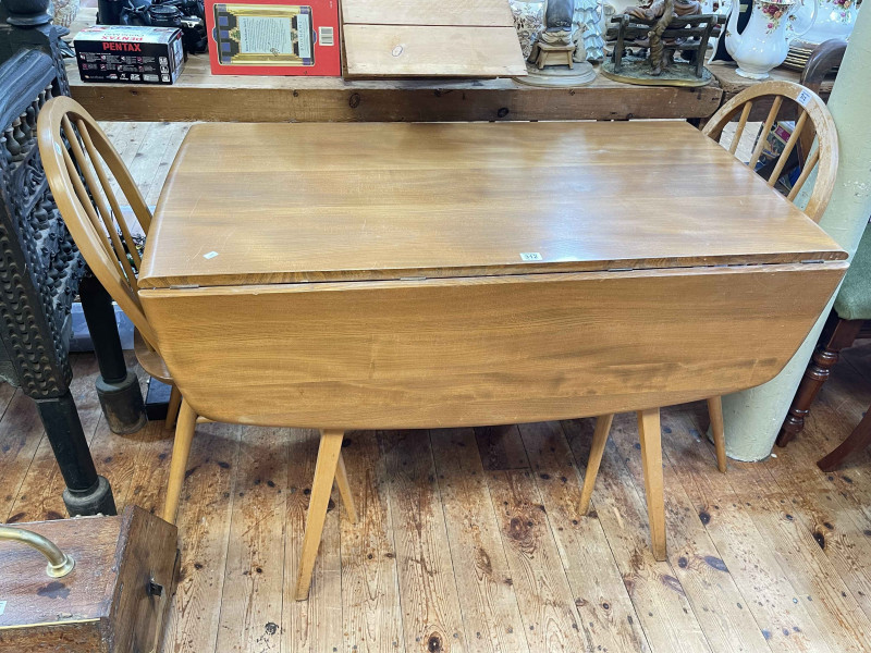 Ercol Windsor drop leaf dining table and pair Quaker back dining chairs.