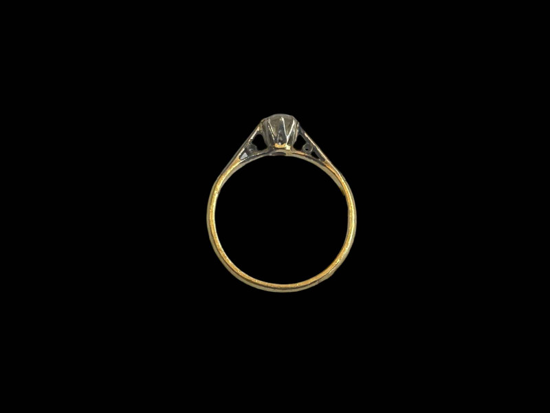 Diamond solitaire 18 carat gold and platinum set ring, size J.