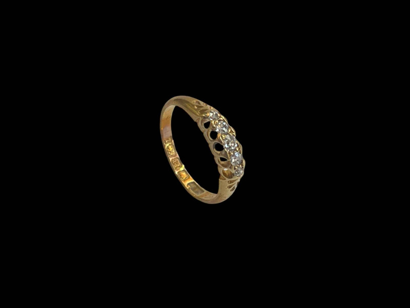 Diamond five stone 18 carat gold ring, size J.
