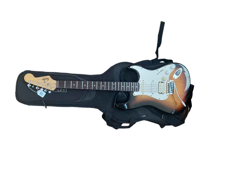Squire by Fender Strat guitar (China) with case.
