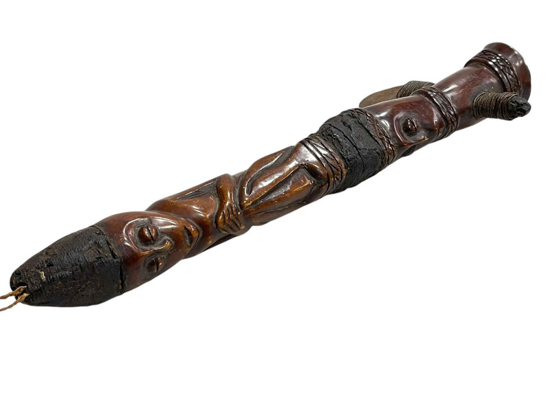 Carved wood tribal axe.