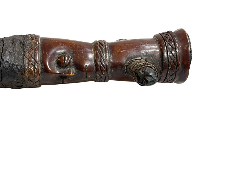 Carved wood tribal axe.