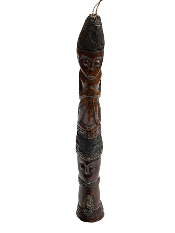 Carved wood tribal axe.