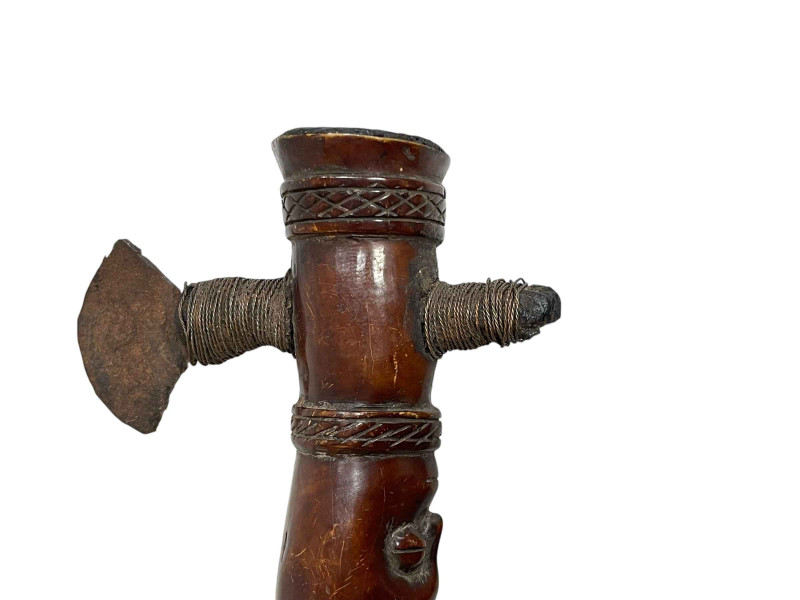 Carved wood tribal axe.