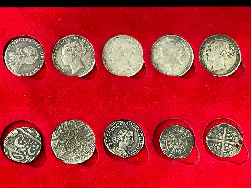 Two Edward III hammered silver coins and other silver coins.