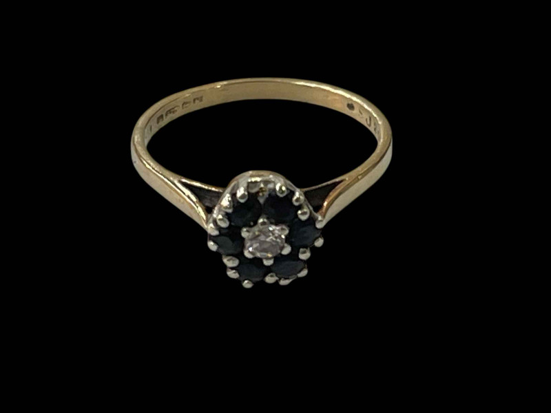 18 carat gold, sapphire and diamond claw set ring, size O.