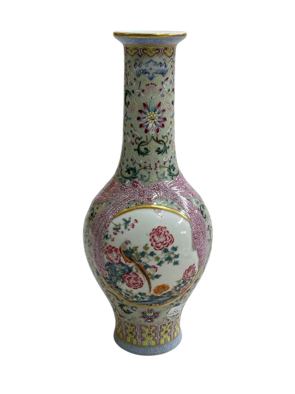 Chinese Famille Rose vase with bird and floral decoration with iron red mark to base, 29cm.