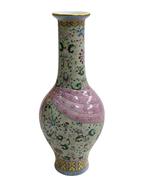 Chinese Famille Rose vase with bird and floral decoration with iron red mark to base, 29cm.