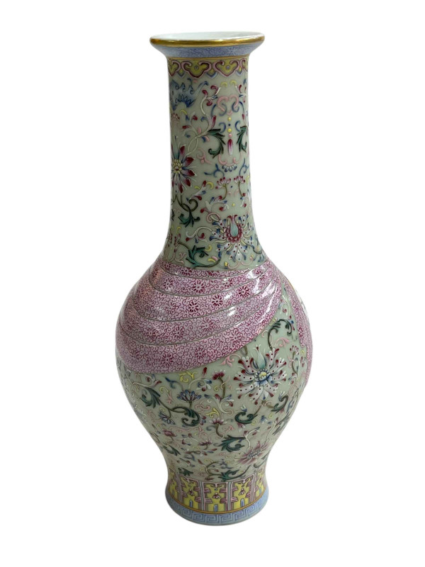 Chinese Famille Rose vase with bird and floral decoration with iron red mark to base, 29cm.