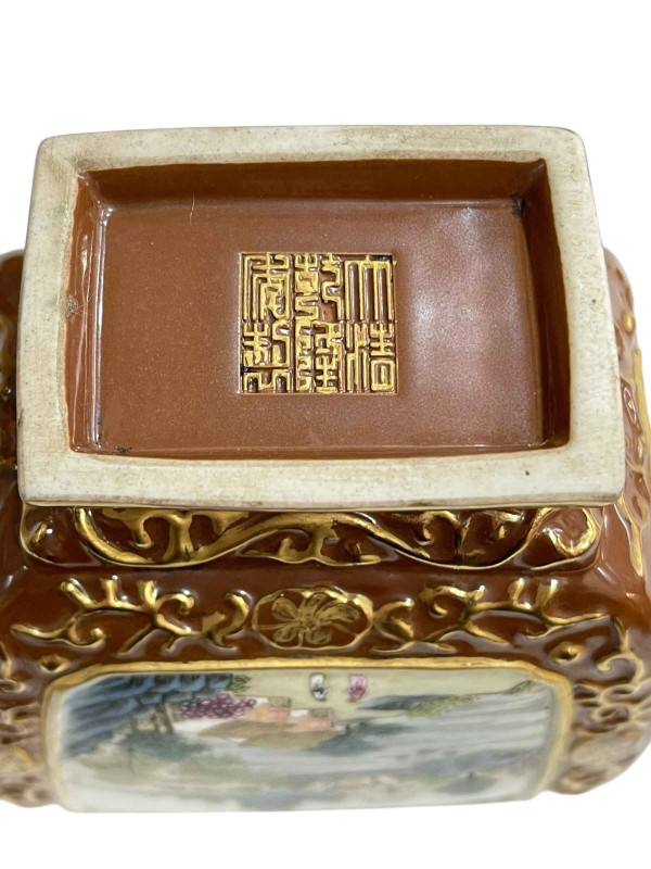 Chinese two handle vase decorated with landscape and verse panels on brown and gilt ground, impressed mark, 20cm.