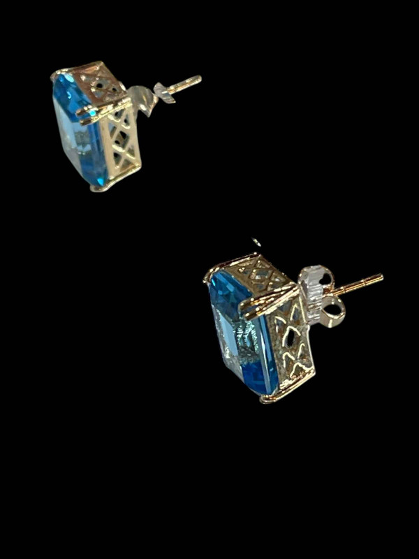 Pair of 9 carat gold Swiss blue topaz rectangular earrings, topaz 16.20 carats.