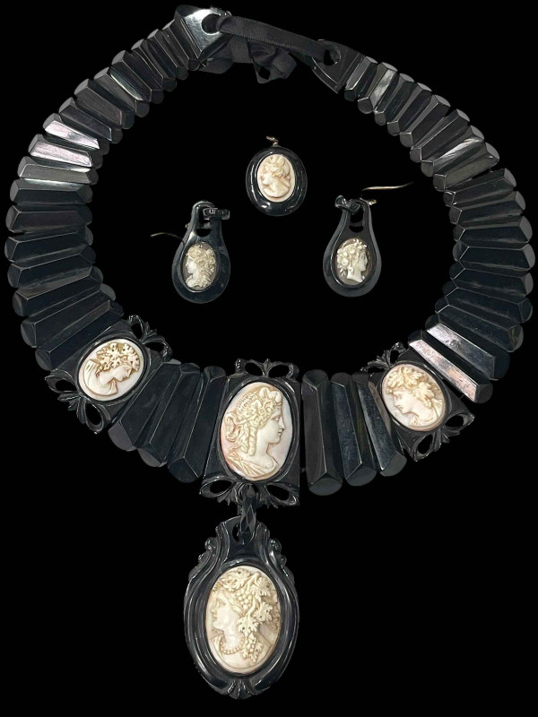 Whitby jet necklace, earrings and pendant with cameo insets.