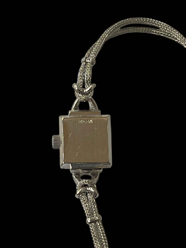 Longines 14k white gold bracelet watch.