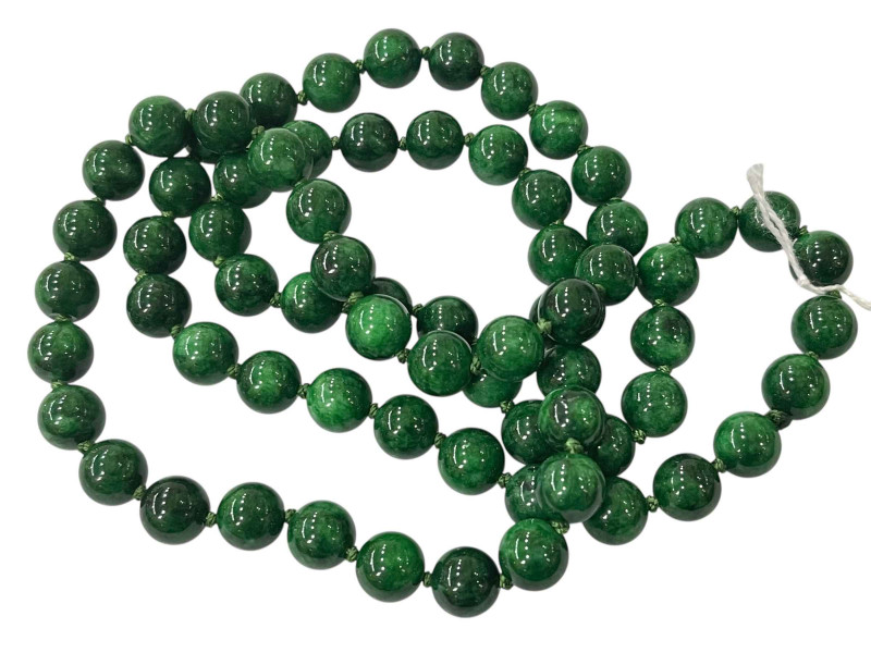 Necklace of green jade style beads.