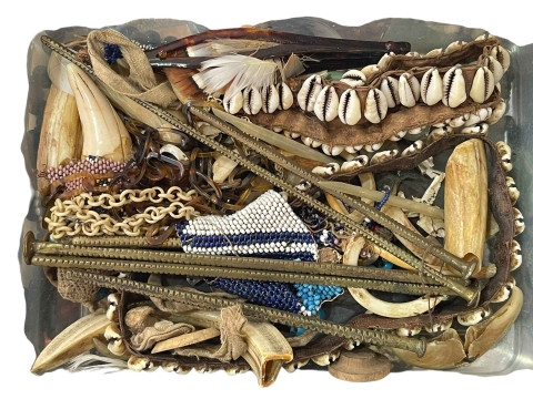 Two boxes of jewellery and ethnic pieces.
