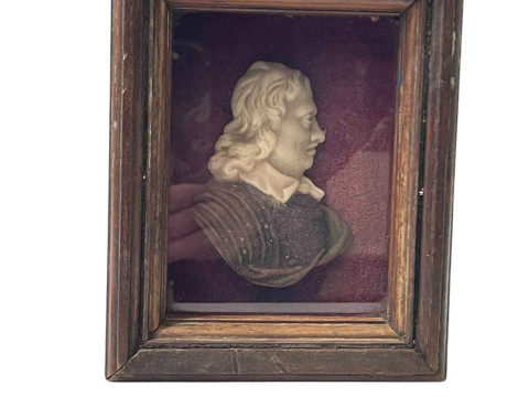 Wax relief portrait in glazed frame, 18cm by 15cm.