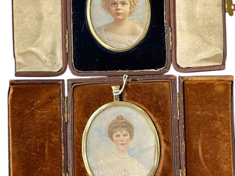 Two framed miniature portraits.