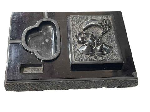 Ebony and Whitby Jet desk top set, 25cm across.