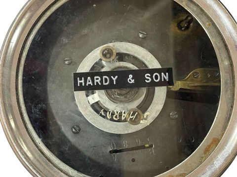 Pigeon timing clock in carrying case, bearing label for repair in May 1949, together with four pigeon racing books. thumbnail