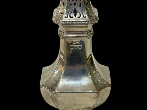 Large silver sugar sifter, London 1911? (marks worn), 20cm.