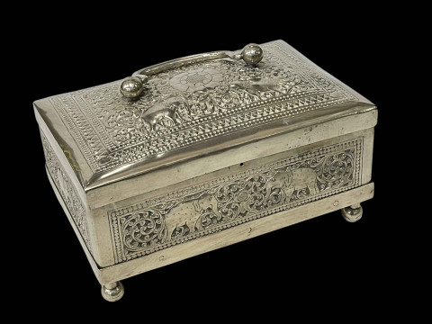 Indian silvered box decorated with elephants.
