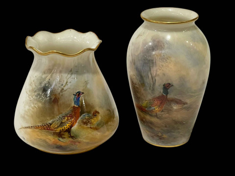 Two Royal Worcester pheasant vases signed J Stinton, 957 and 461.