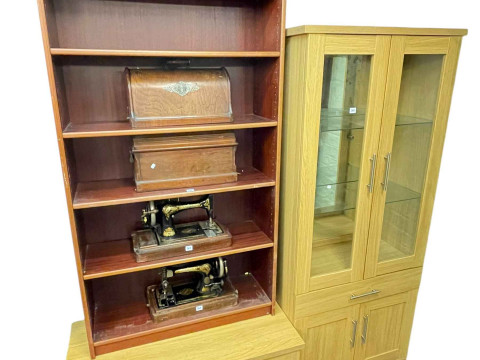 Contemporary light oak illuminated display cabinet and matching two door...