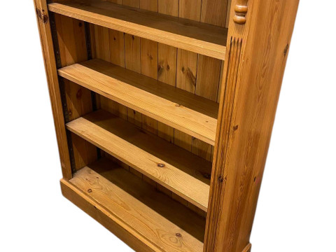 Pine open bookcase with three adjustable shelves, 116cm by 91cm by 29.5cm.