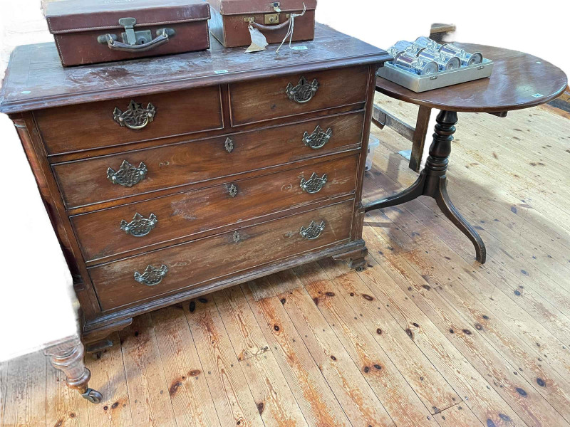 Georgian mahogany chest of two short above three long graduated drawers with rounded quarters and ogee bracket feet, 87.5cm by 103cm by 54cm together with a Georgian mahogany circular snap top supper table, 72cm by 72cm diameter.