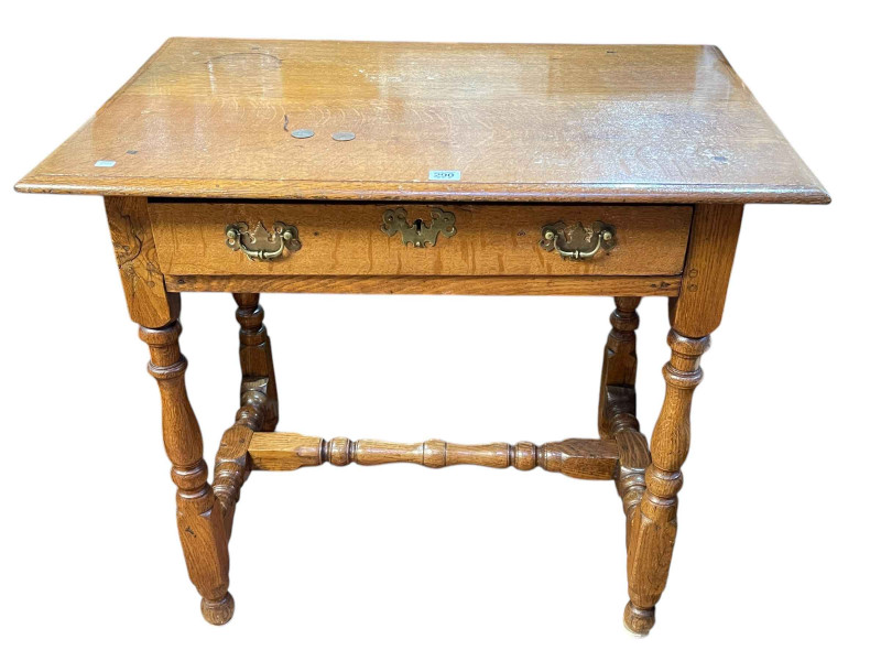 Georgian oak single drawer side table on turned legs joined by turned stretcher, 74cm by 82cm by 53cm.