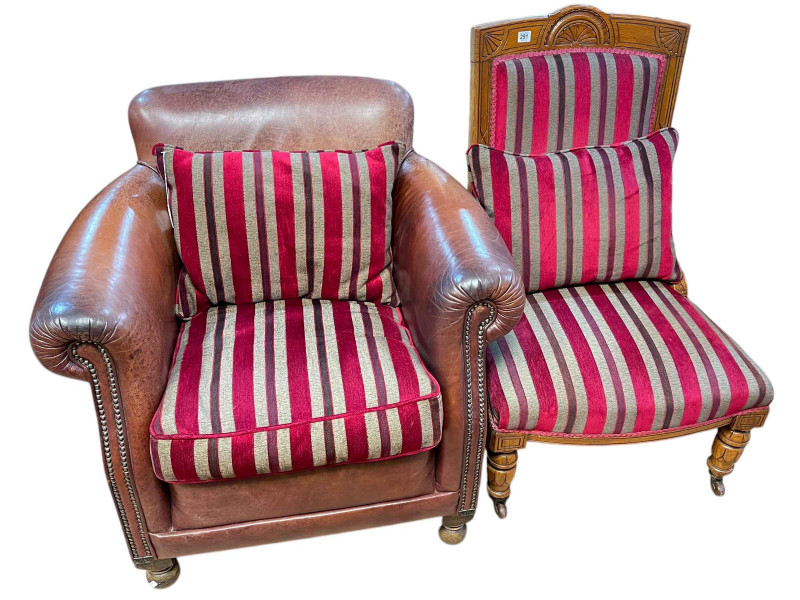 Victorian oak framed nursing chair in striped fabric together with a leather and brass studded armchair in matching fabric (2).