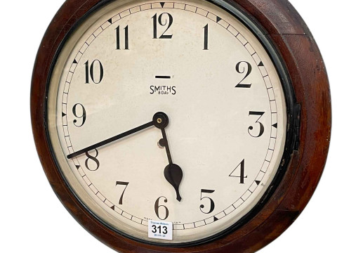 Circular mahogany cased Smiths wall clock.
