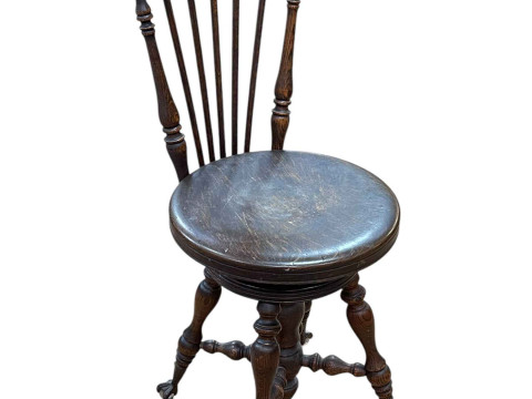 Late Victorian/Edwardian American revolving music chair on cast and glass...