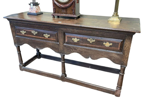 Period oak two drawer dresser on turned legs, 81cm by 156cm by 53cm.
