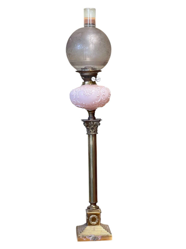 Victorian brass corinthian column oil lamp with pink glass reservoir and etched shade, 98cm.