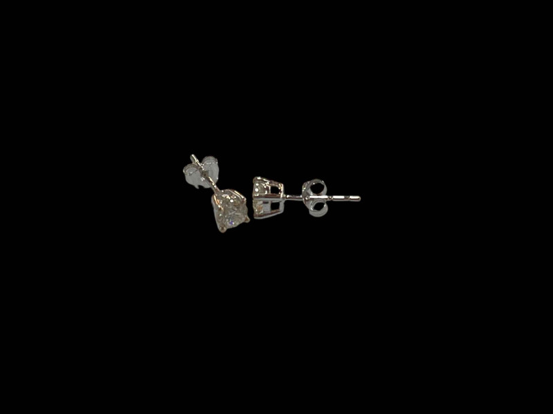 Pair of 18 carat white gold and diamond stud earrings.