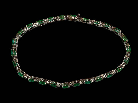 18 carat white gold, emerald and diamond bracelet, the emeralds totalling 7.70 carats. thumbnail