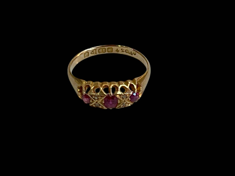 Ruby and diamond 18 carat gold ring, hallmarked Chester 1902, size L/M.
