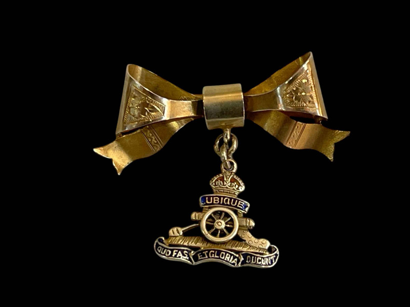 British Royal Artillery pendant with 9 carat gold ribbon brooch, 3.5cm across.