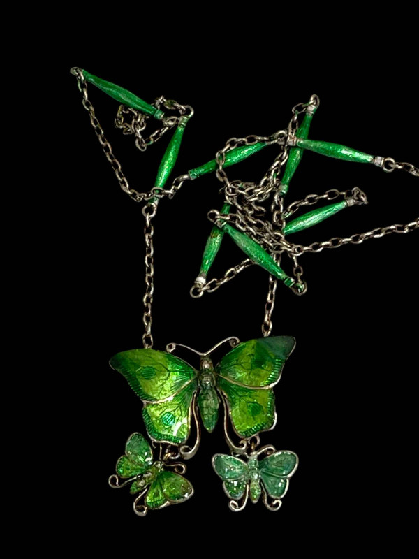 Green enamel butterfly silver necklace.