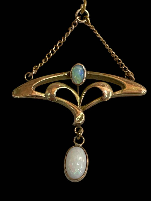 Art Nouveau gold and opal pendant, formerly a brooch, 3.5cm across.