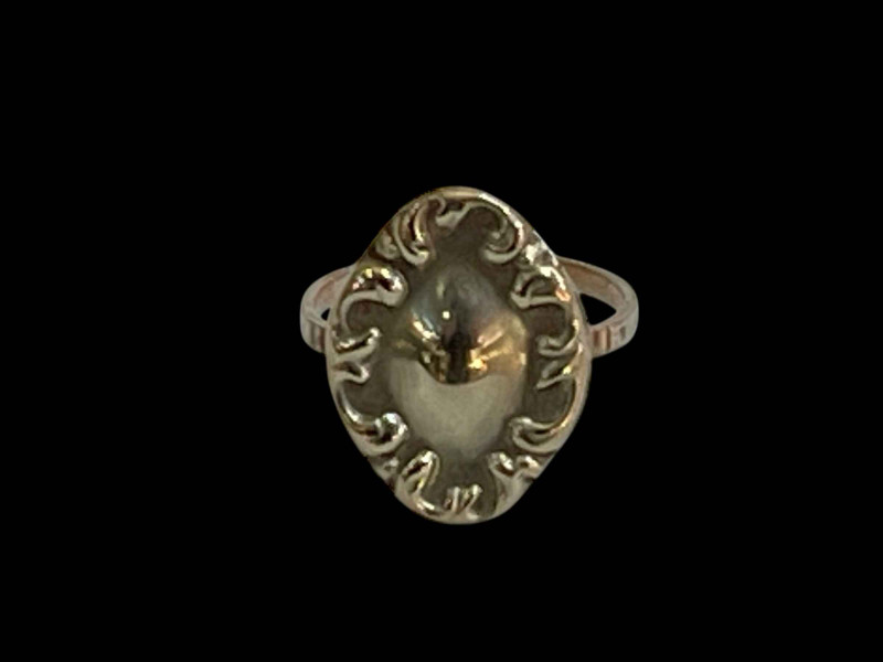 Scroll bordered ring, marked 10 carat, size J.