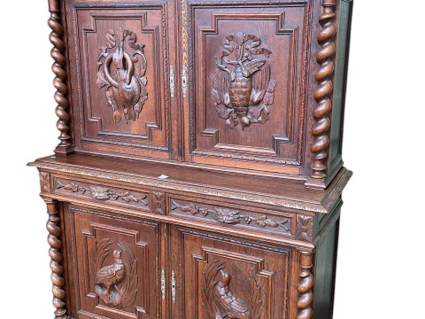Victorian Continental carved oak hunters cabinet having four carved panel...