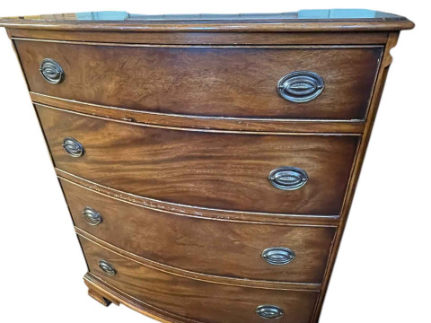 Siesta mahogany bow front chest of four long drawers on ogee bracket feet,...