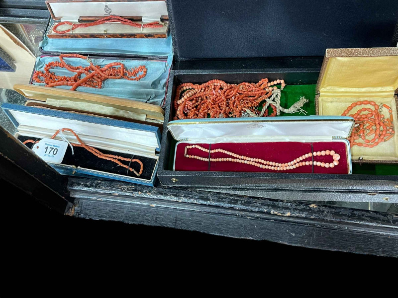 Various coral necklaces.