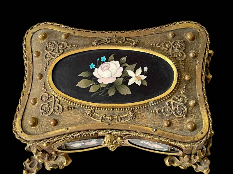 Continental gilt casket with Pietra Dura oval panels, 16.5cm across at feet.