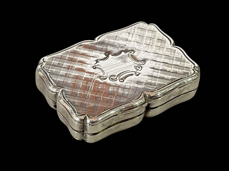 Early Victorian silver vinaigrette by Nathaniel Mills, Birmingham 1841, 3.25cm across.