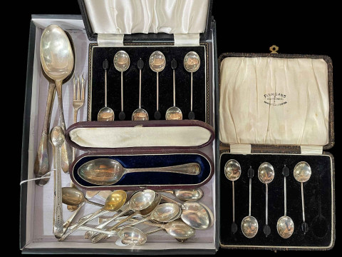 Silver flatware including three Georgian tablespoons, bright cut tongs,...