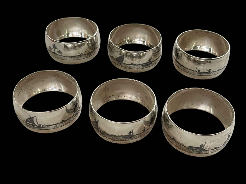 Set of six Egyptian silver napkin rings.
