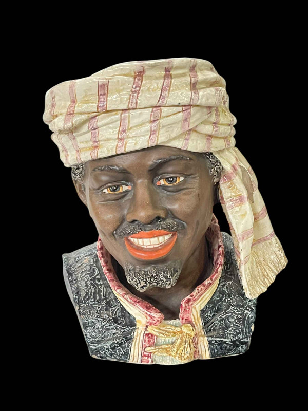 Large pottery tobacco jar in the form of a Moorish man's head.